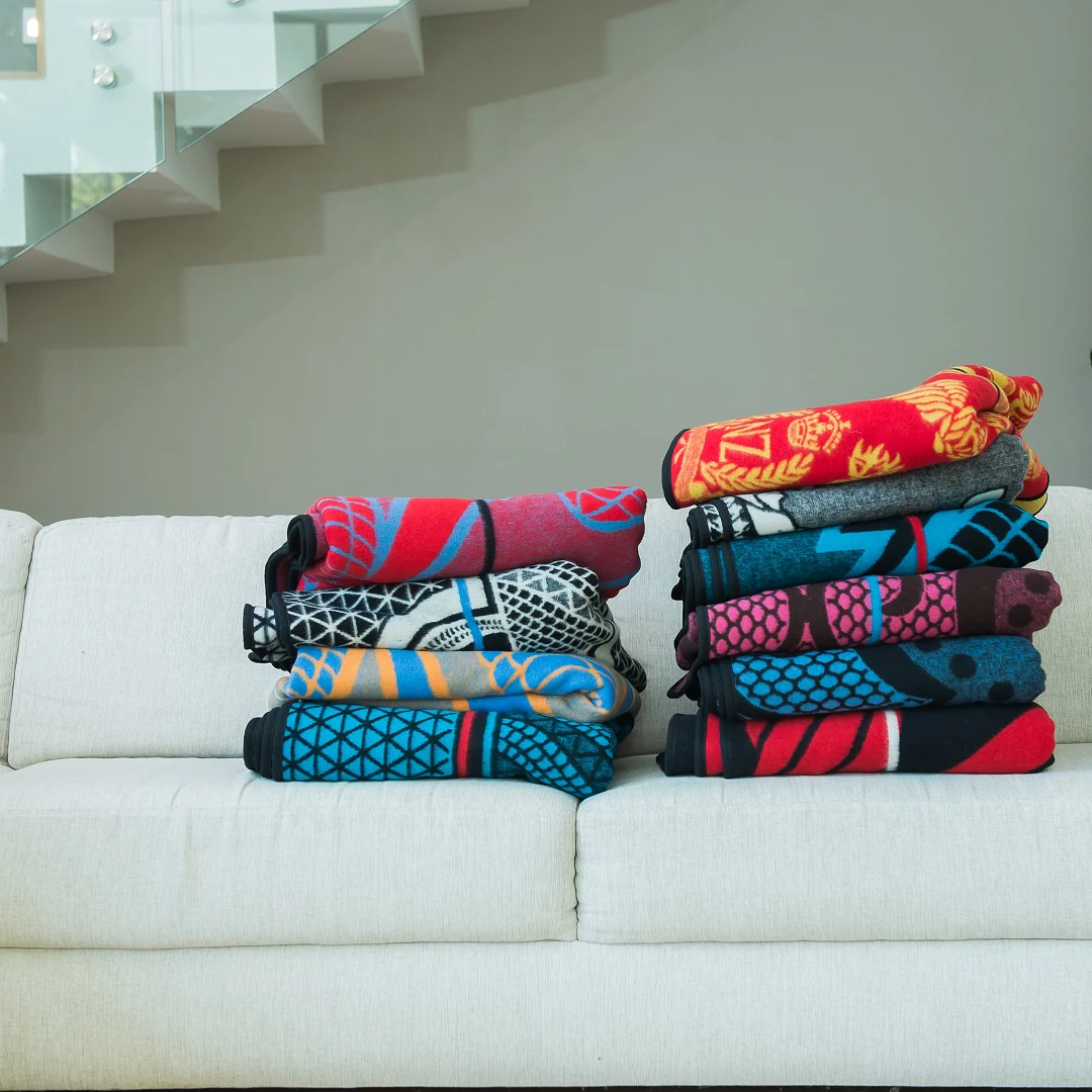 Basotho Blankets neatly folded on a couch