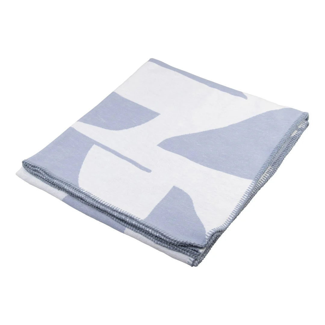 Folded blanket with a logo on a white background