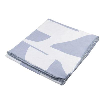 Folded blanket with a logo on a white background