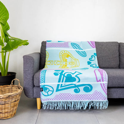 The Bella Vita Basotho My Africa Throw in Light Aqua/Kingfisher is a serene tribute to Africa's natural beauty. Featuring Basotho heritage patterns, this soft acrylic blanket offers lasting comfort and vibrant hues inspired by African rivers and skies.