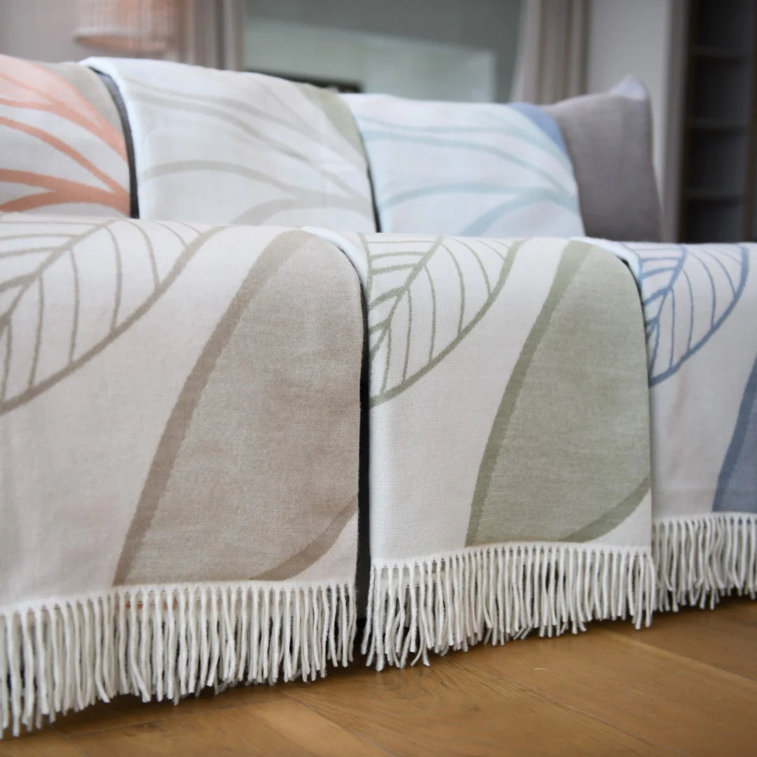 Bella Vita Atrium Cobblestone-Canyon throw draped over sofa in modern living room