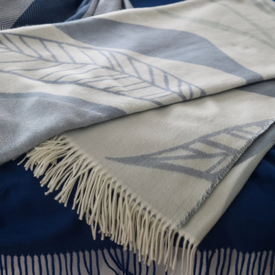 Close-up of Overcast Sky and Eggshell weave on the Haven & Earth  Bella Vita Atrium throw