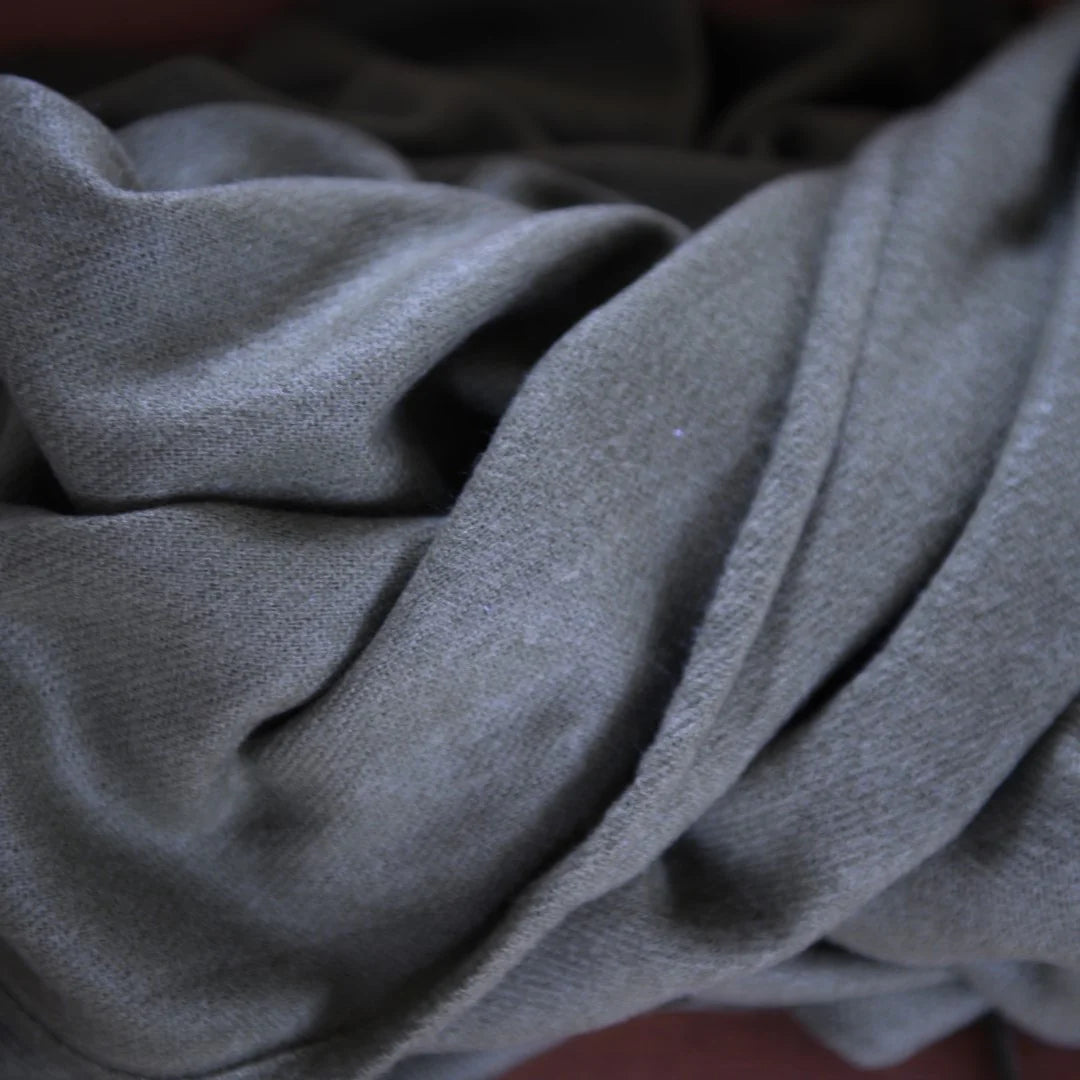 Close-up of iron grey Melody plain throw texture
