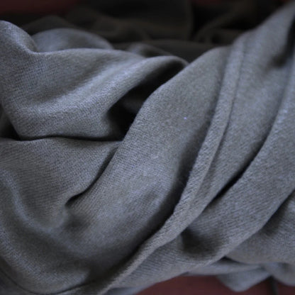 Close-up of iron grey Melody plain throw texture