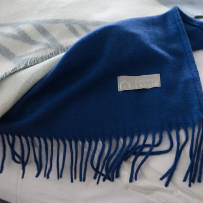 Close-up of midnight blue Melody plain throw texture