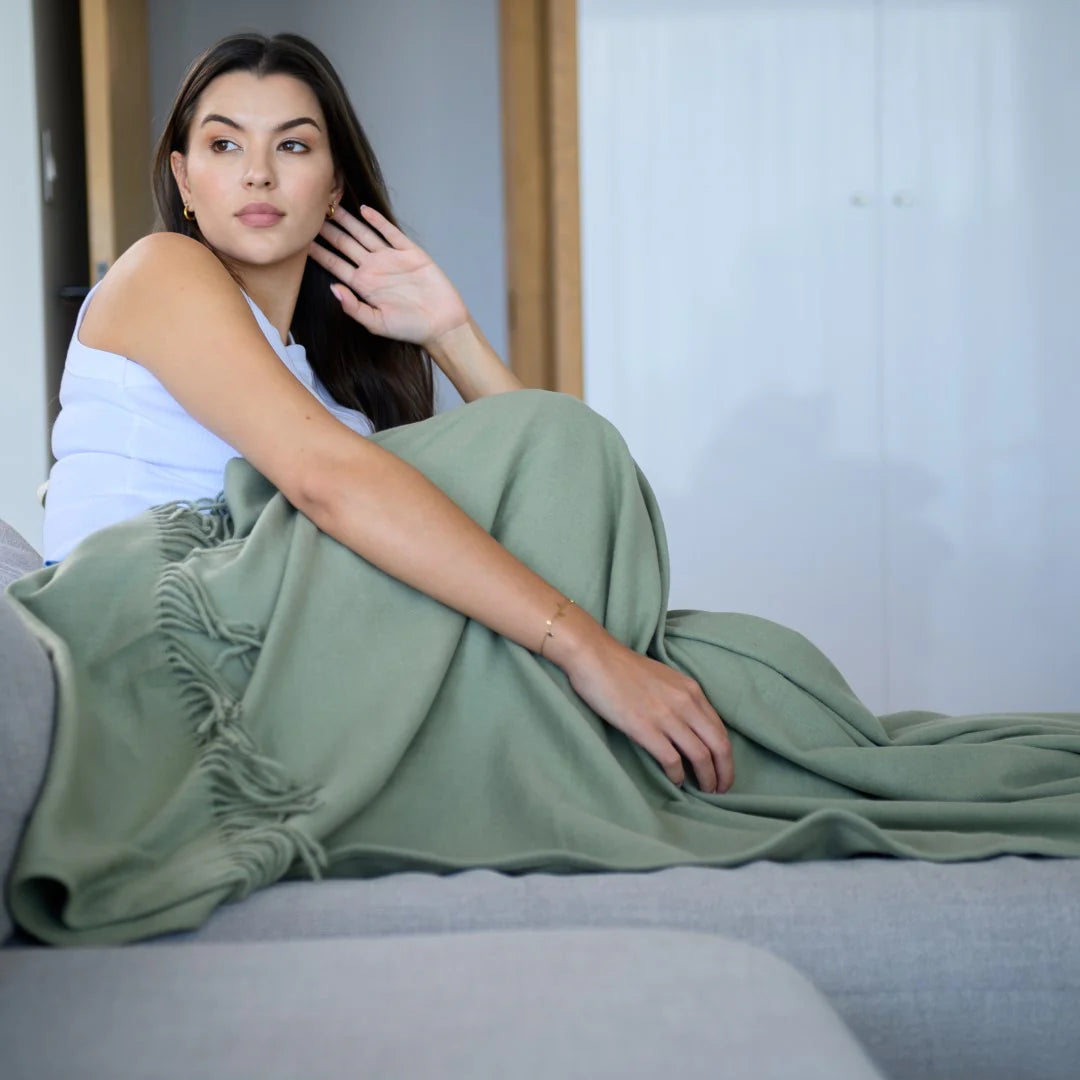 “Melody Plain Throw in Olive – ultra-soft acrylic blanket”