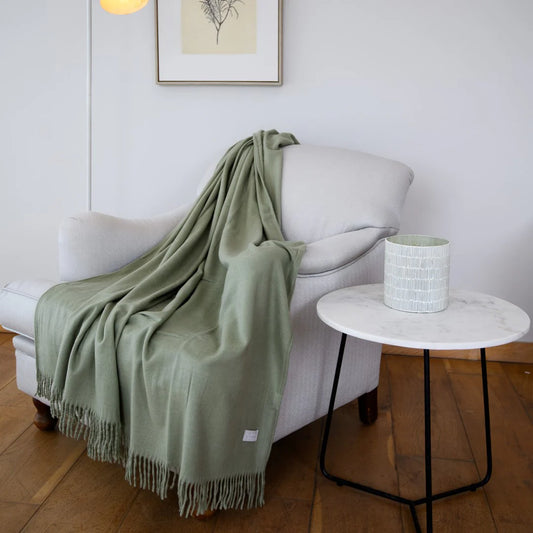 “Melody Plain Throw in Olive – ultra-soft acrylic blanket”