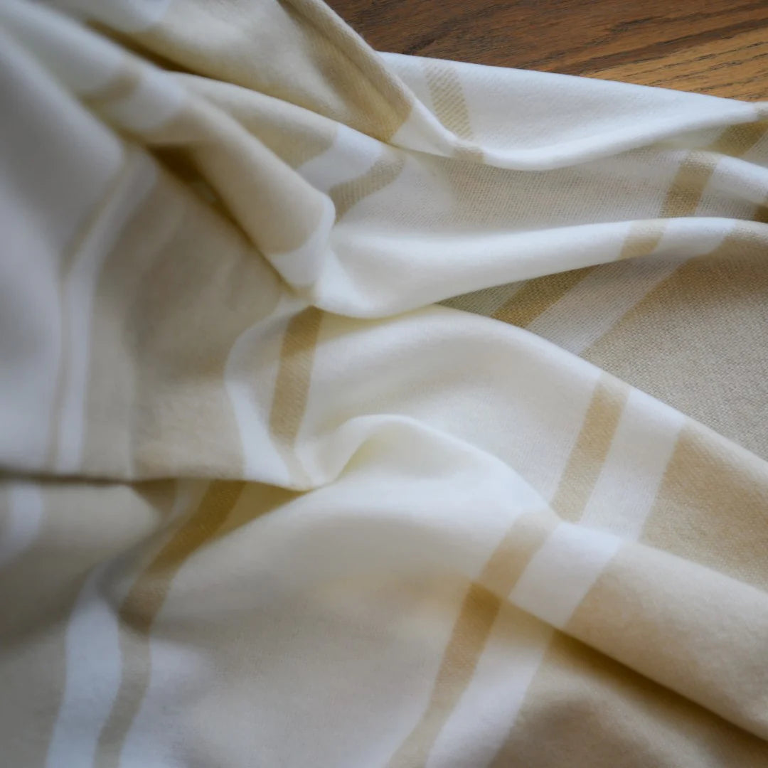 Haven & Earth Melody Runway throw in Bone/Natural – bold striped, lightweight acrylic, 150 × 200 cm.