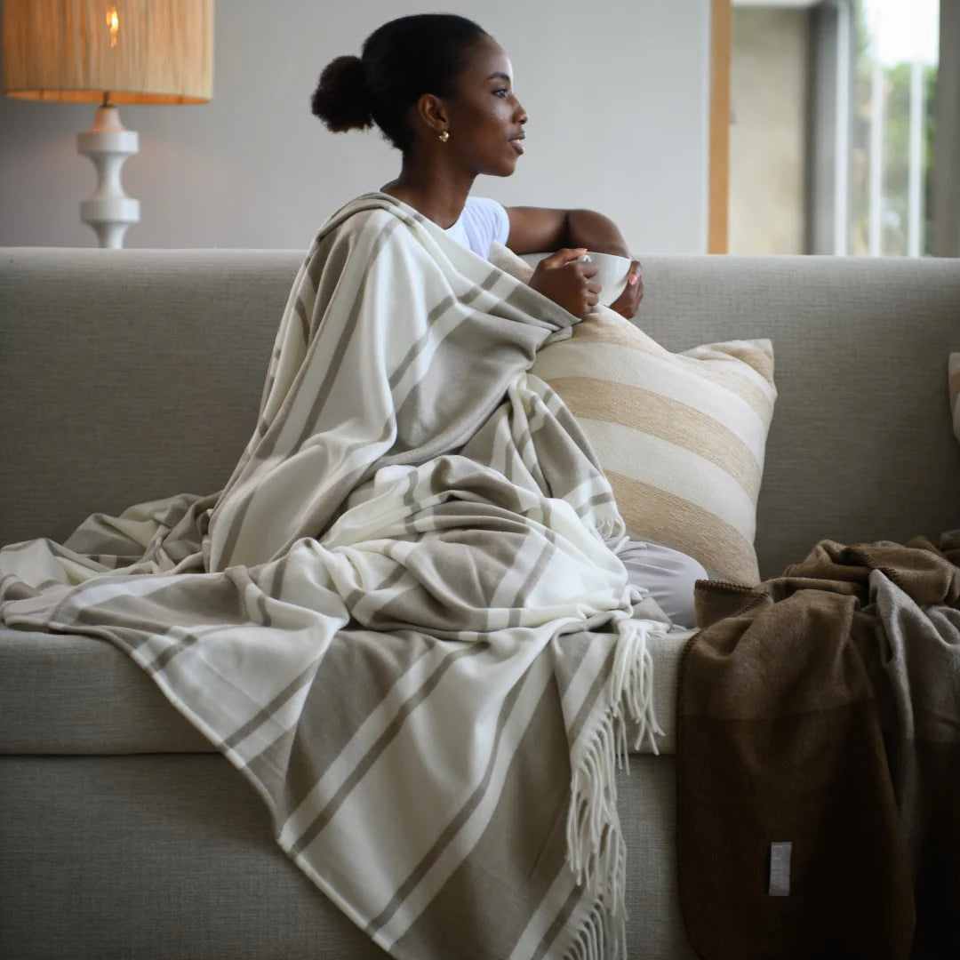 Haven & Earth Melody Runway throw in Cobblestone/Natural – bold striped, lightweight acrylic, 150 × 200 cm.