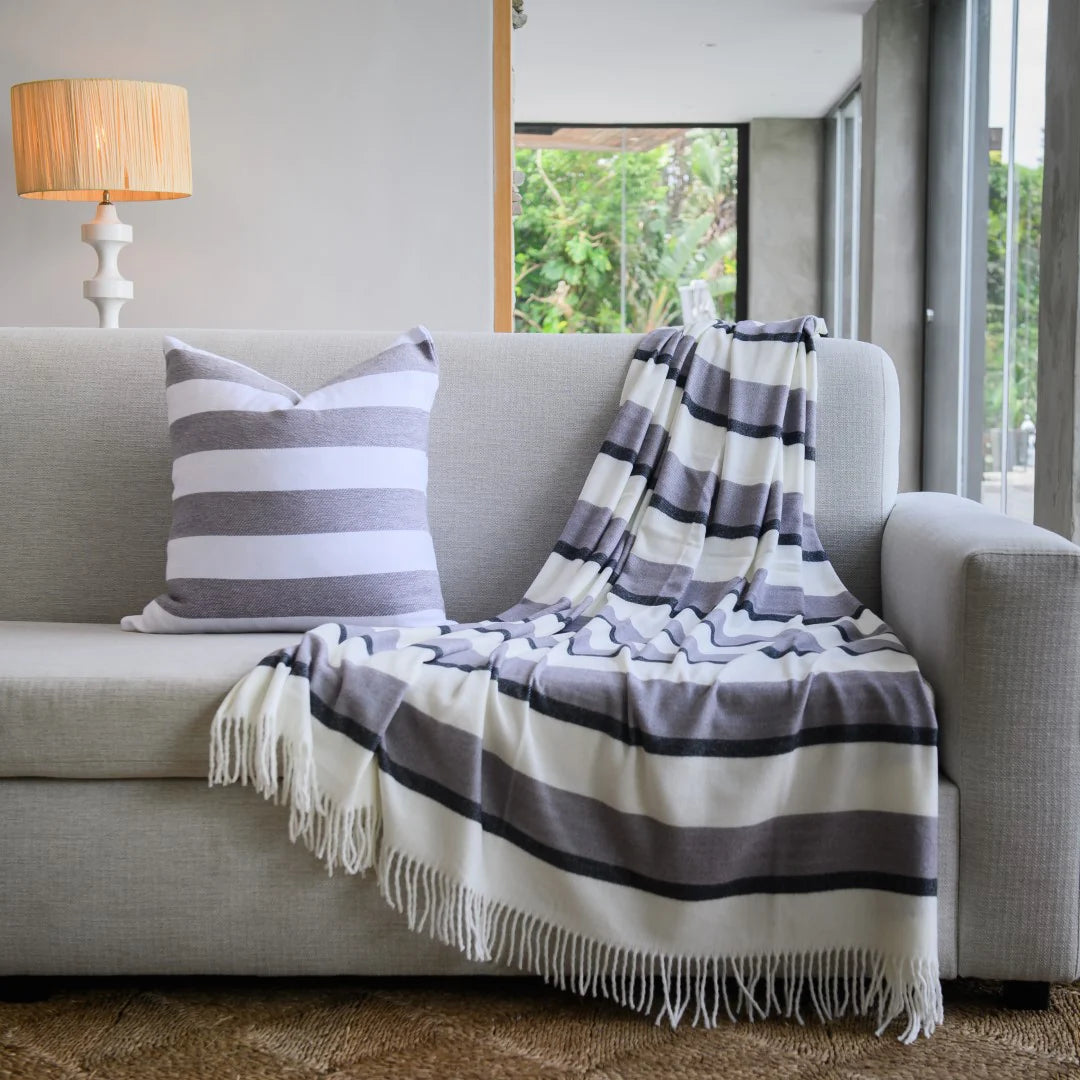 Haven & Earth Melody Underline throw in Black/Iron – bold striped, lightweight acrylic, 150 × 200 cm.