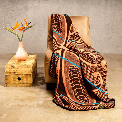 Sefate Basotho Blanket: Vibrant geometric patterns in red, blue, yellow, and green symbolize love, fertility, and heritage. Perfect for cultural ceremonies and home decor