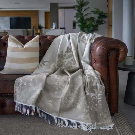 Bella Vita Dappled Leaves jacquard throw in cobblestone grey and bone, 150 × 200 cm, super-soft acrylic