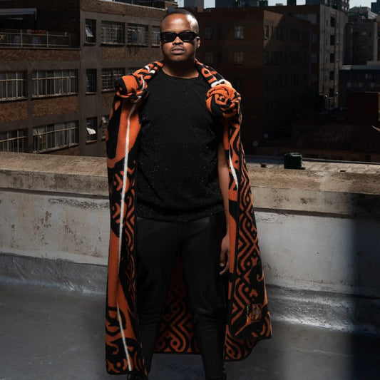 Celebrate love & elegance with the Majaba-Jaba Wool Blanket—a 50% wool, 50% acrylic masterpiece symbolizing devotion, leadership & African heritage. Handcrafted with passion. Perfect for gifting or luxury home décor.