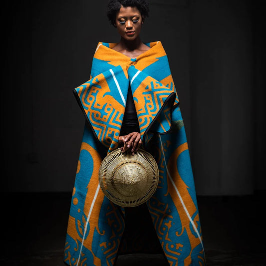 Celebrate love & elegance with the Majaba-Jaba Wool Blanket—a 50% wool, 50% acrylic masterpiece symbolizing devotion, leadership & African heritage. Handcrafted with passion. Perfect for gifting or luxury home décor.